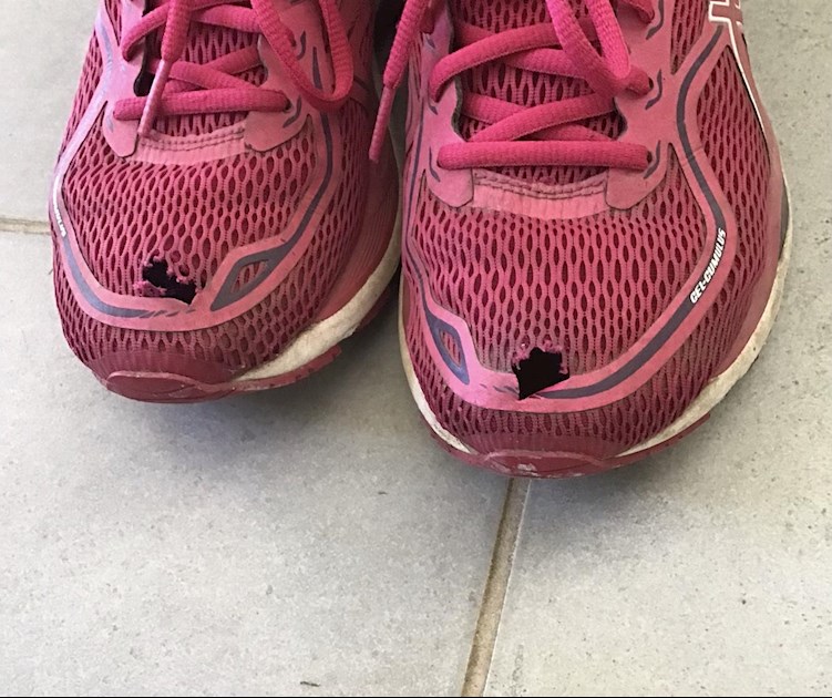Holes in toes of running shoes!: I'm 