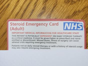 Red and white adult steroid emergency card