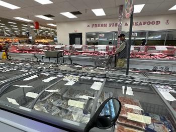 One of the (/several ) seafood cases at the north town R-N market in Fresno. 