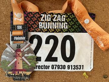 running number and medal