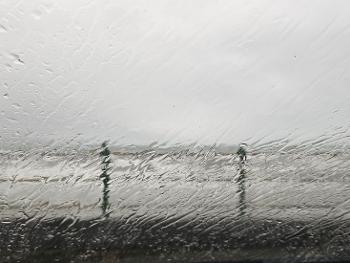 A picture of heavy rain on a windscreen
