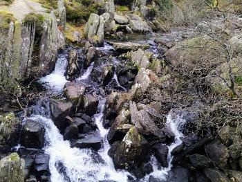 River with jagged grey rocks in moorlands