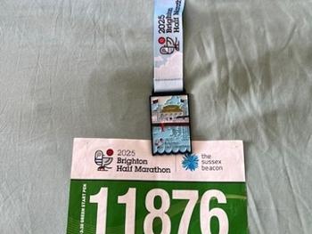 Finisher medal and race number