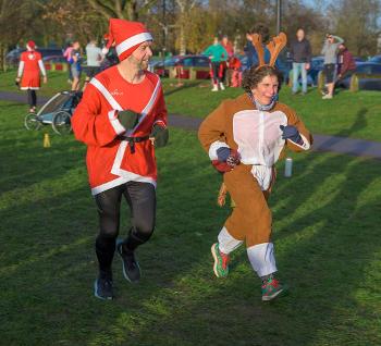 Runners dressed as Santa and reindeer