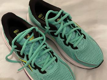 Mint green running shoes