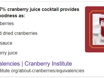 Picture of cranberry juice in a glass.