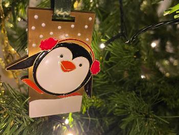 Perfect penguin on the tree