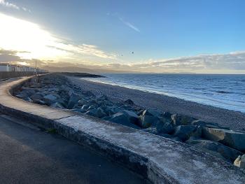 Beach front in calm weather an hour from dusk