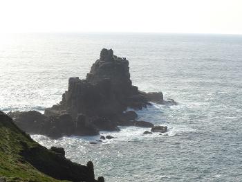 A stack in the rough sea near Land's End. 
