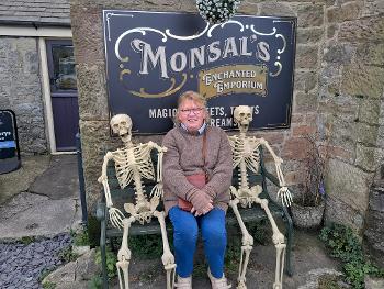 Picture of me between 2 skeletons for Halloween.outside a cafe at monsal head, Derbyshire