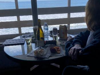 The hammer and myself enjoying charcuterie and Montrachet while watching whales feeding.