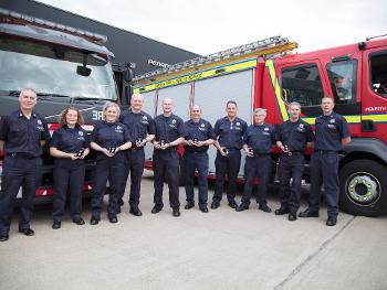 Medal ceremony for Firefighters with over 5 years service presentation by Cumbria Chief 
