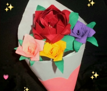 The paper flower bouquet. She posted it and put sparkles and hearts around it!