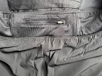 Running shorts with a pocket designed to hold a smartphone