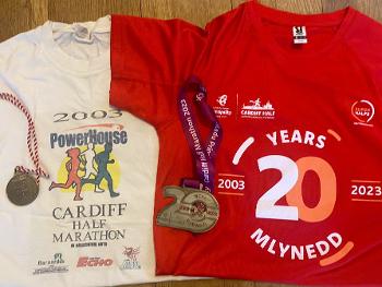 2 Tshirts and medals…20 years apart. 