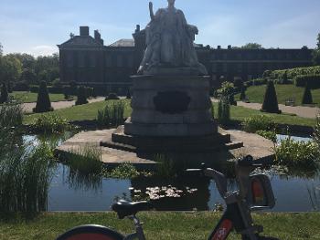 Kensington Palace Gardens on a ‘ Boris’ bike in London this bank holiday long weekend . x 