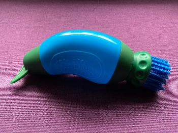 Green and blue Boot Buddy brush