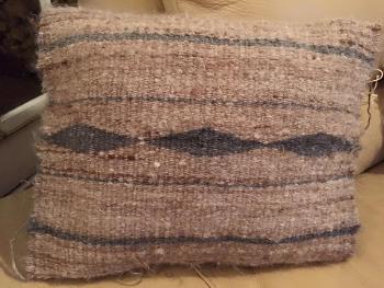 A mohair pillow, brown and gray, made from my goats