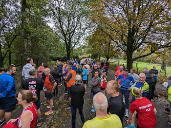 Runners line up at start of parkrun.