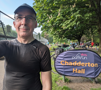 Selfie in front of Chadderton Hall parkrun sign