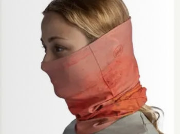 Woman wearing a Buff over he lower face