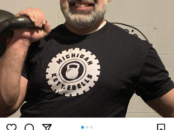 Dr.Geo wearing a Michigan Kettlebells shirt