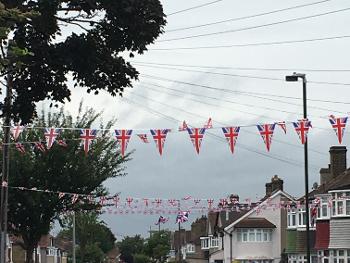 Street party bunting blowing in the wind 