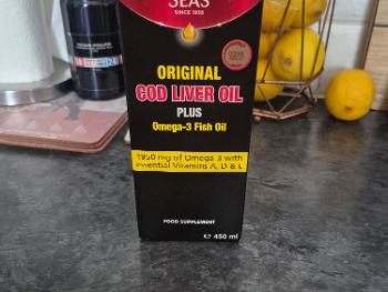 Seven Seas Cod Liver Oil, black packaging with red and yellow