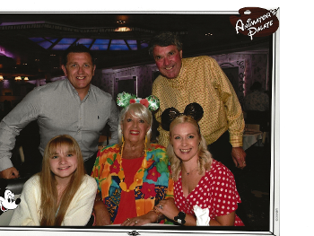 Family photo of dinner on Disney Magic Cruise