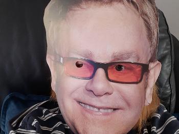 Me wearing an Elton John mask 