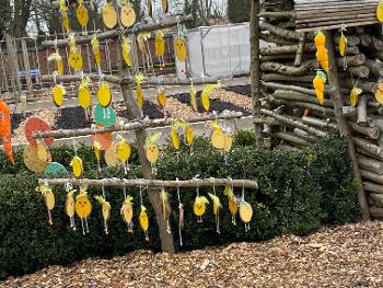 Rows of wooden Easter yellow chicks