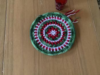 A Christmas colour inspired crochet mandala.
