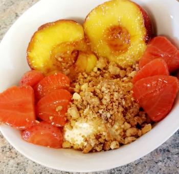 Warmed peaches with crumble topping.