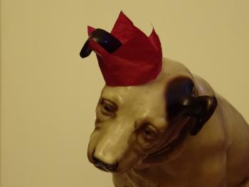 Ornament: Nipper - HMV dog - wearing a hat from a Christmas cracker  