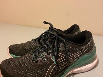 Black and teal ASICS gel Kayano 28 trainers