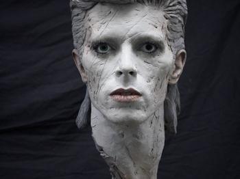 Portrait sculpture in pottery clay of David Bowie as the character Aladdin Sane  