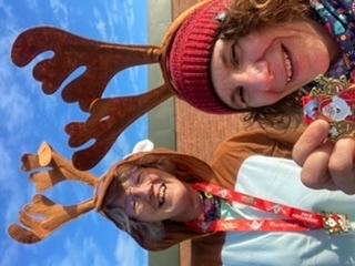 Two runners in reindeer costume