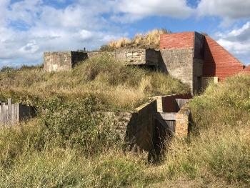 The Germans built their bunkers under these hills facing the North Sea. 