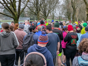 The start of the parkrun, the back view of lots of eager runners.