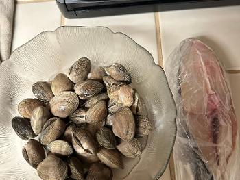 Fresh clams and halibut… fish is fresh too, cut this morning.