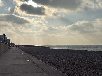 Sun trying to shine through the clouds on my seafront walk