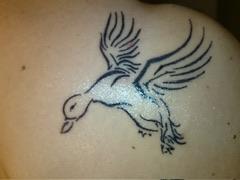 Flying duck tattoo…