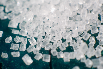 A photo of sugar grains taken from Wiki