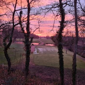 Sun rising over the golf course 