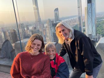 My husband my daughter and me on top of the rock NYC for her masters degree me wheelchair 